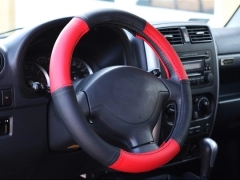 Pokrowce samochodowe, Pokrowce na kierownice skórzane w kolorze czarno - czerwony,.