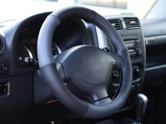 Pokrowce samochodowe, Pokrowce na kierownice skórzane w kolorze czarno - szary,.